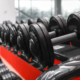 Rack With Different Dumbbells In Gym