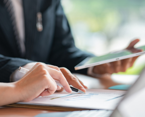 Young Business Teamwork Working With Business Report Document On Office Desk