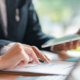 Young Business Teamwork Working With Business Report Document On Office Desk