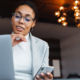 Image Of African American Businesswoman Working On Laptop In Office